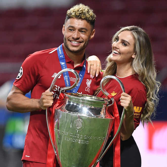 Alex Oxlade-Chamberlain of Liverpool celebrates with his girlfriend Perrie Edwards after his side won during the UEFA Champions League Final between Tottenham Hotspur and Liverpool at Estadio Wanda Me